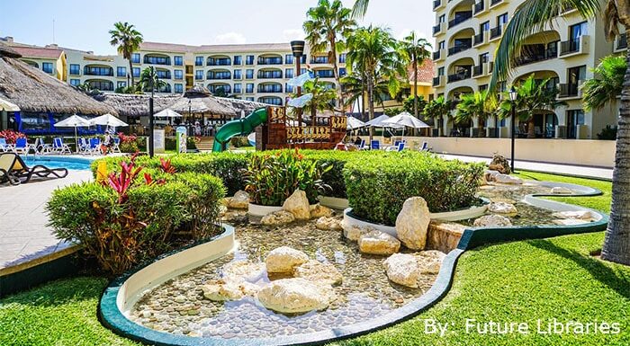 Hotel resort with pool and palm trees