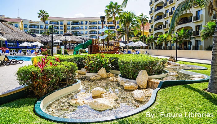 Hotel resort with pool and palm trees